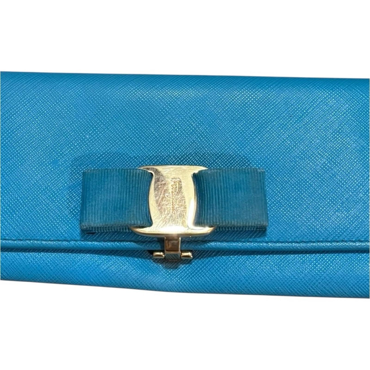 Salvatore Ferragamo Blue Wallet with Gold Detail and Bow closure