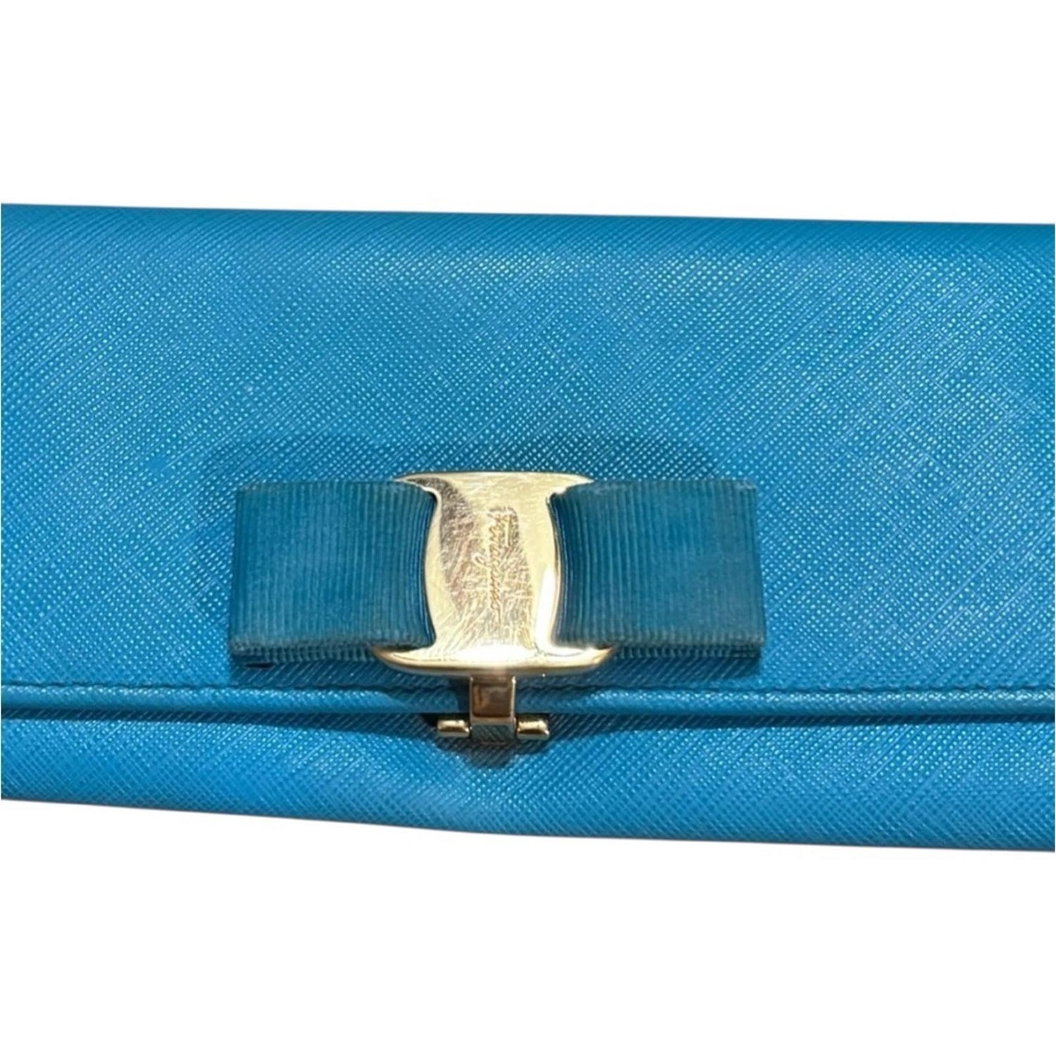 Salvatore Ferragamo Blue Wallet with Gold Detail and Bow closure