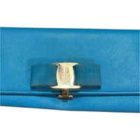 Salvatore Ferragamo Blue Wallet with Gold Detail and Bow closure