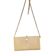CHANEL Coco Button long wallet in beige leather with a gold chain added