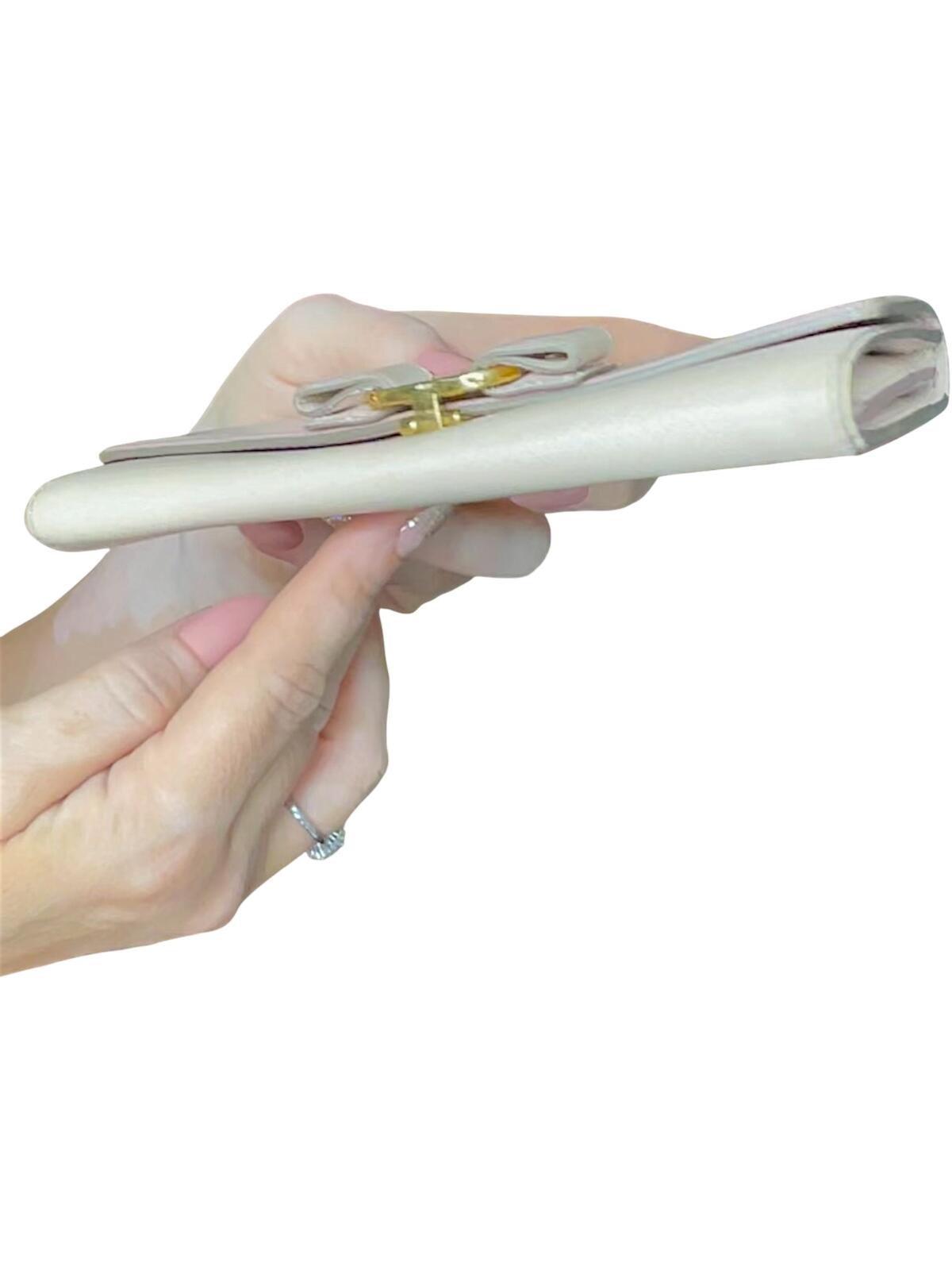 Salvatore Ferragamo Ivory Leather Wallet with Bow Detail