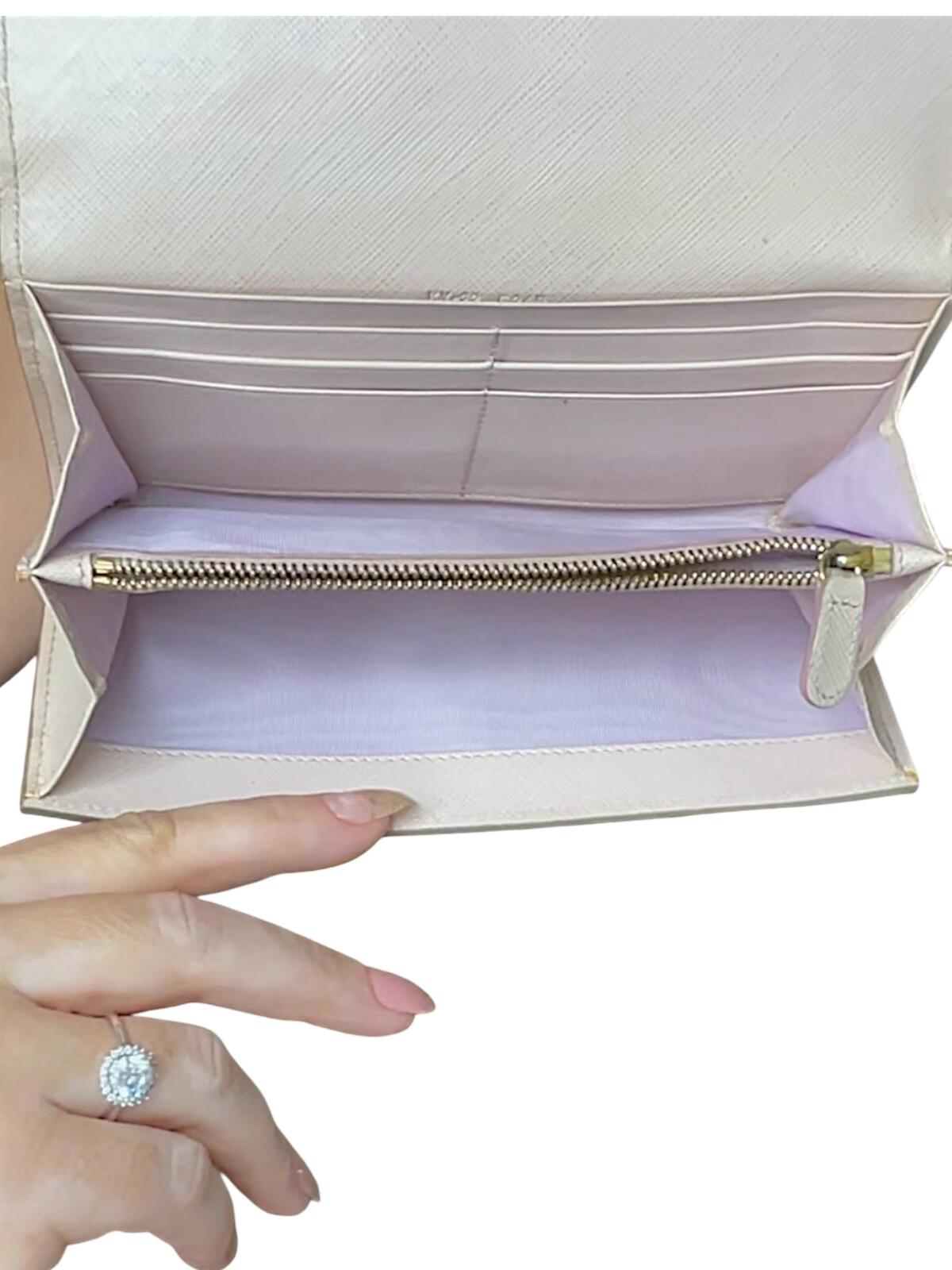 Salvatore Ferragamo Ivory Leather Wallet with Bow Detail