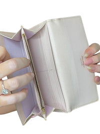 Salvatore Ferragamo Ivory Leather Wallet with Bow Detail