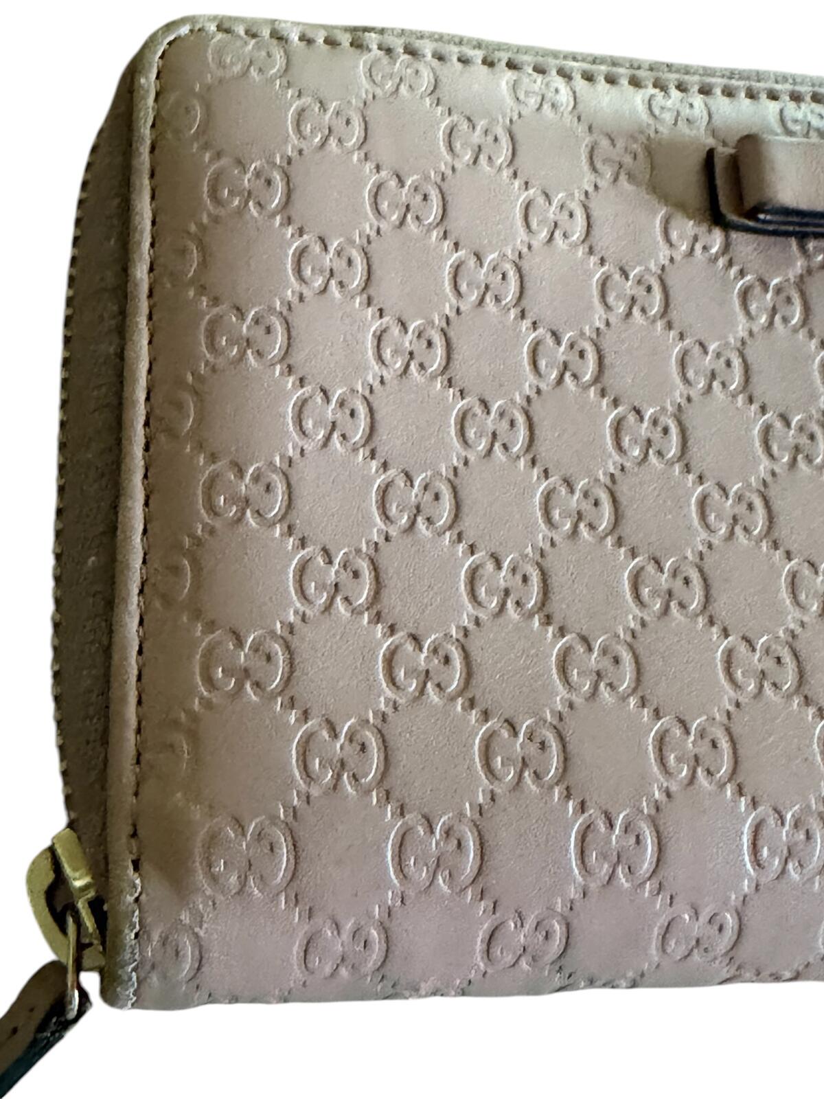 Gucci Pink Microguccissima Bow Wallet Embossed Leather Zip-Around
