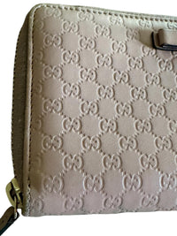 Gucci Pink Microguccissima Bow Wallet Embossed Leather Zip-Around