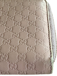 Gucci Pink Microguccissima Bow Wallet Embossed Leather Zip-Around
