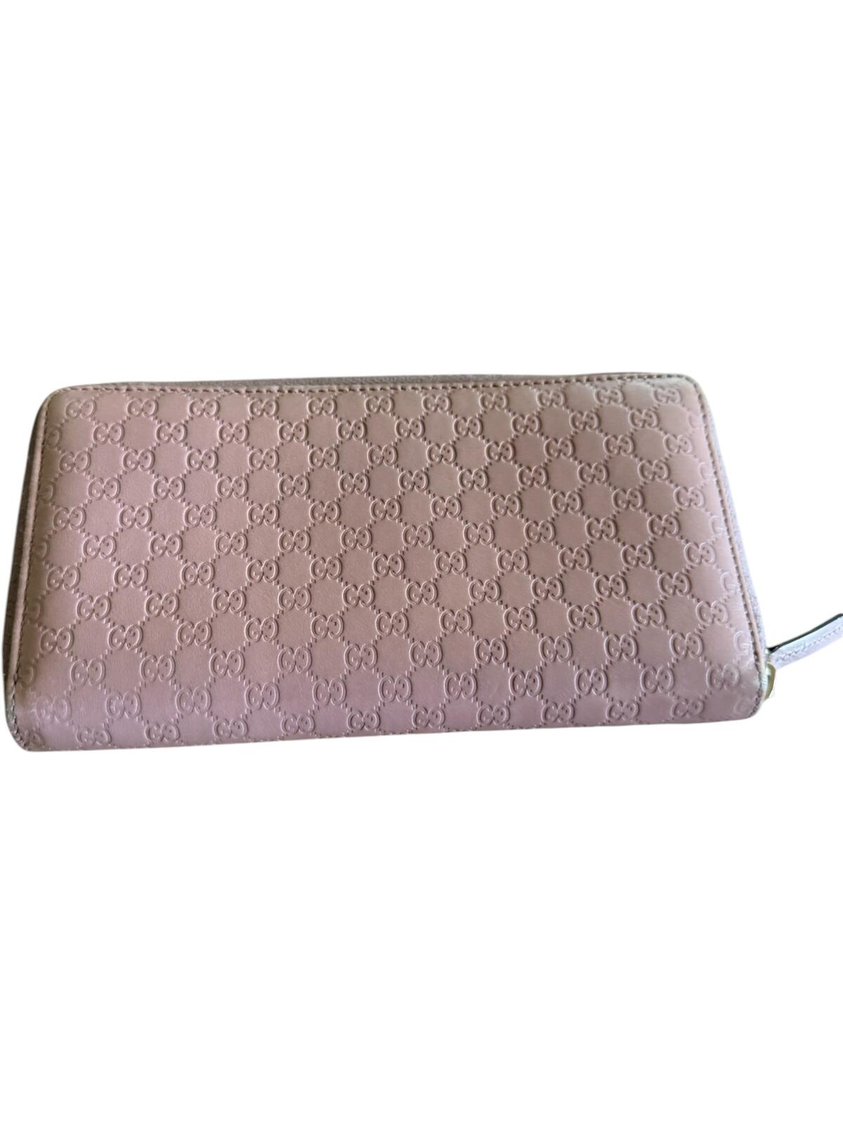 Gucci Pink Microguccissima Bow Wallet Embossed Leather Zip-Around