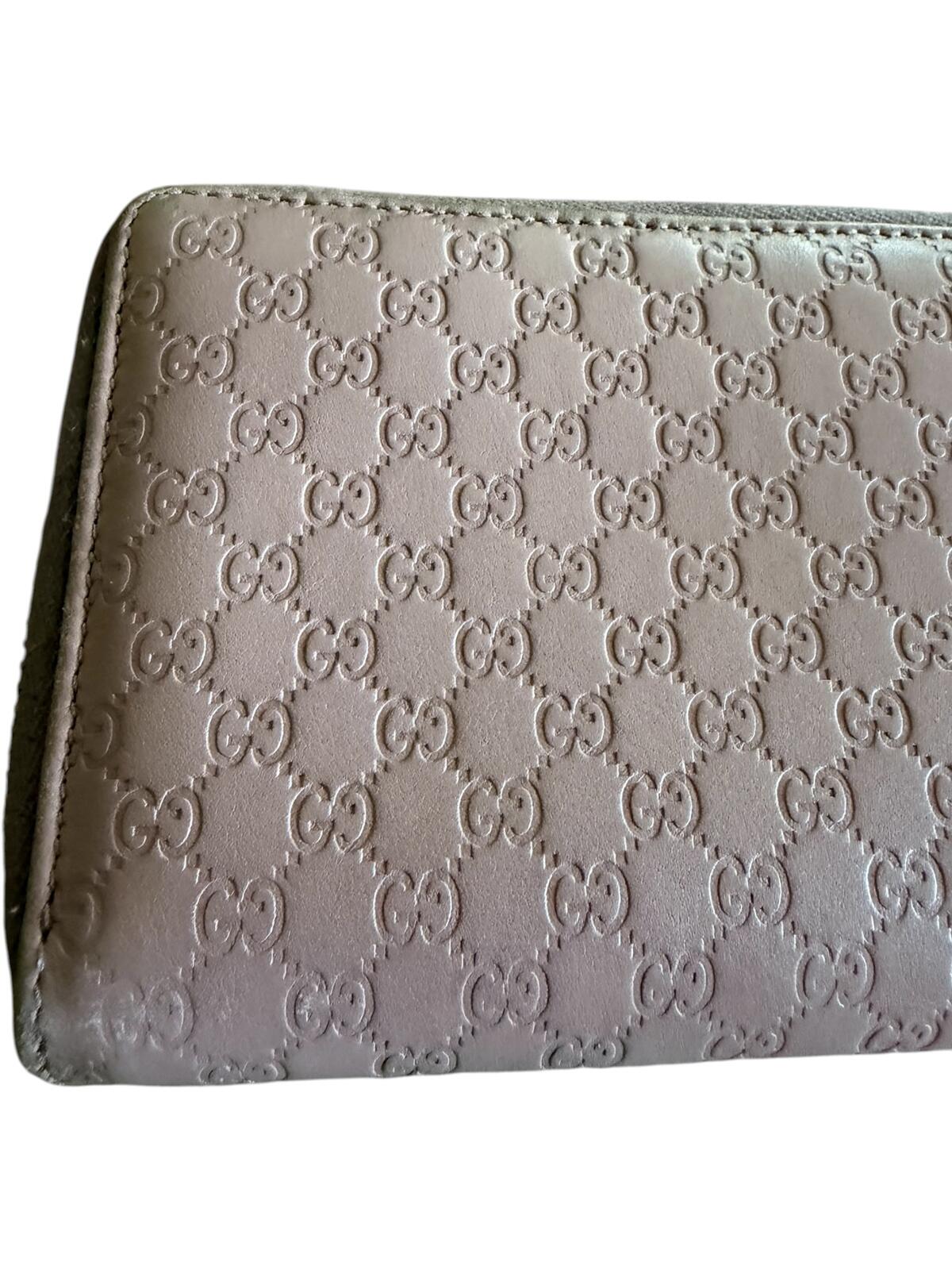 Gucci Pink Microguccissima Bow Wallet Embossed Leather Zip-Around