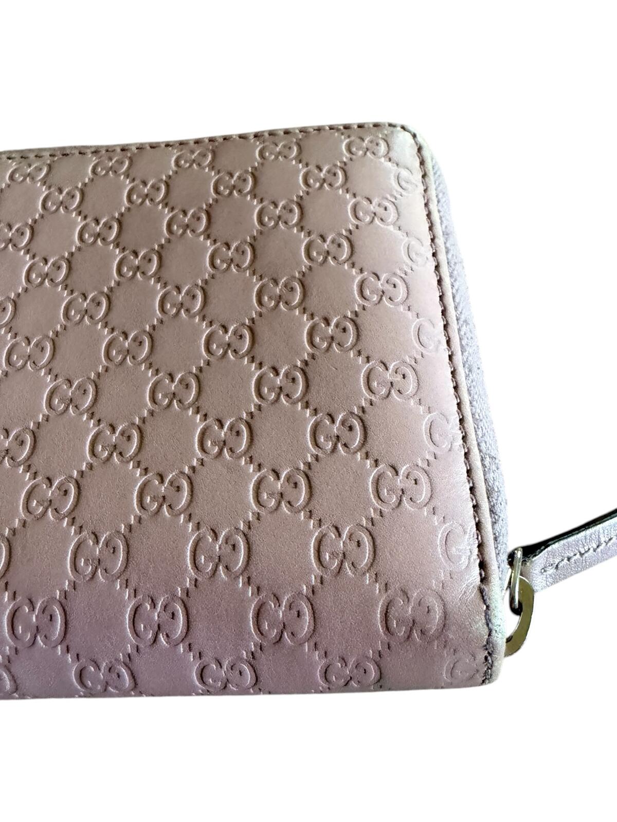 Gucci Pink Microguccissima Bow Wallet Embossed Leather Zip-Around