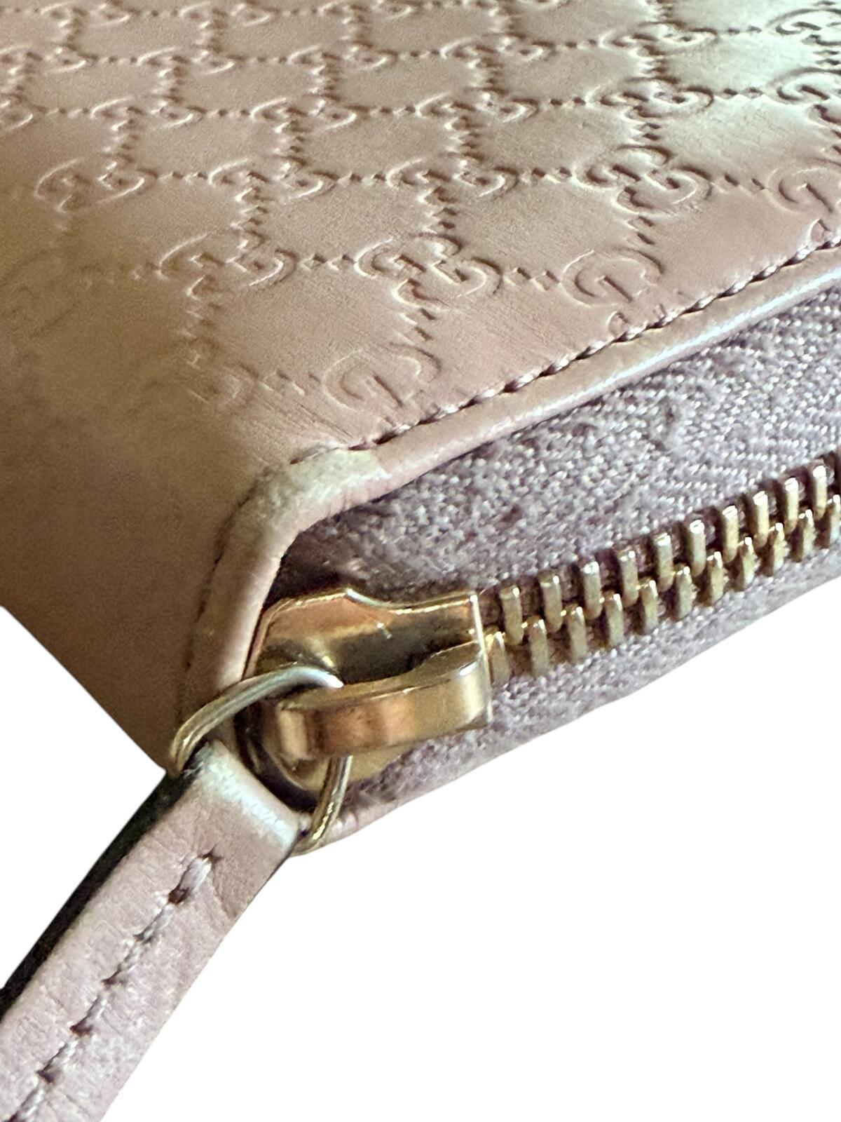 Gucci Pink Microguccissima Bow Wallet Embossed Leather Zip-Around