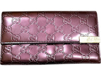 Gucci Embossed Leather Wallet in Burgundy