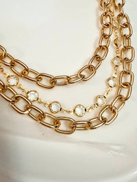 Gold Tone and Rhinestones Handbag Charm Chain layered with gold tone hardware