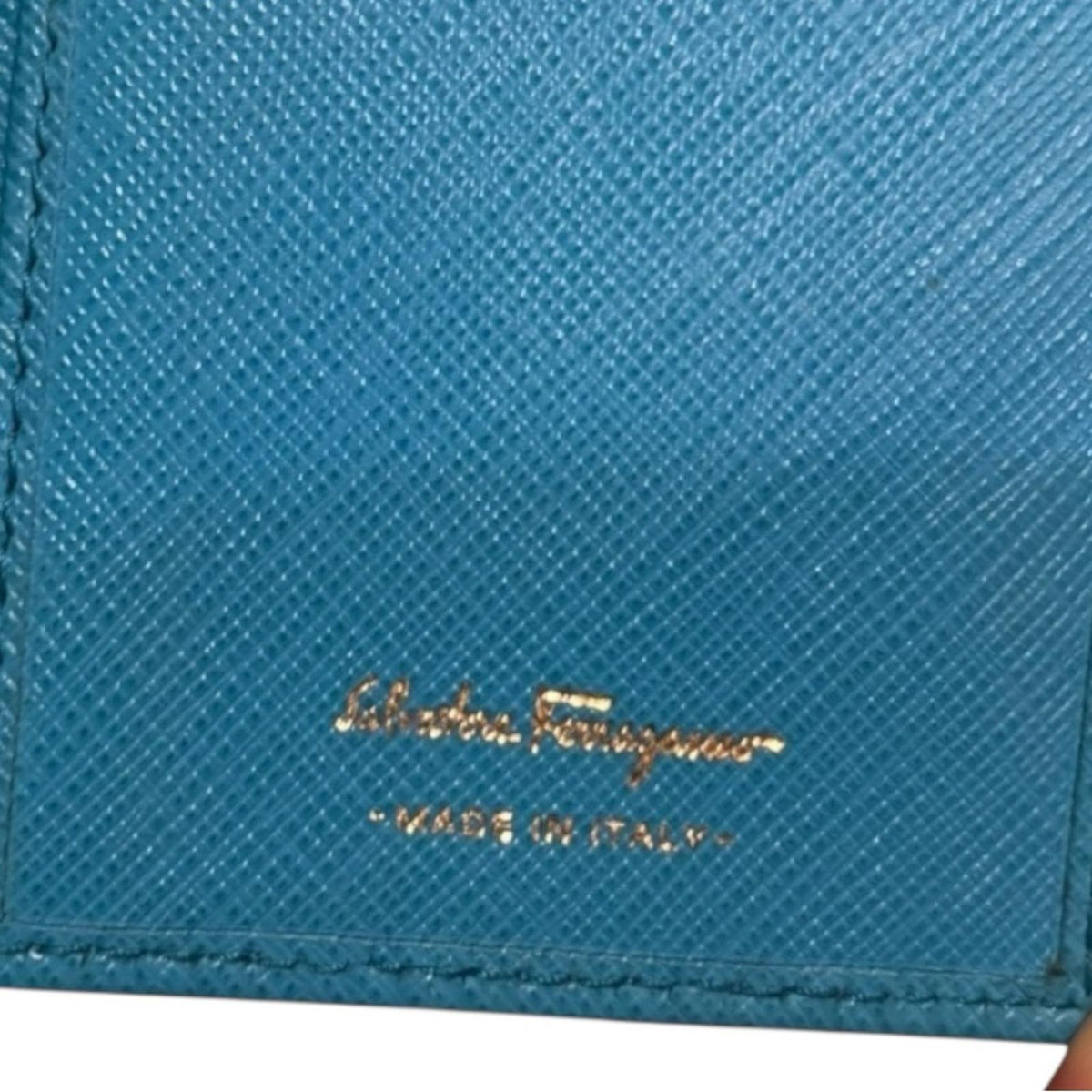 Salvatore Ferragamo Blue Wallet with Gold Detail and Bow closure