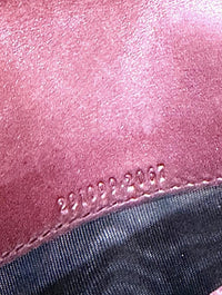 Gucci Embossed Leather Wallet in Burgundy