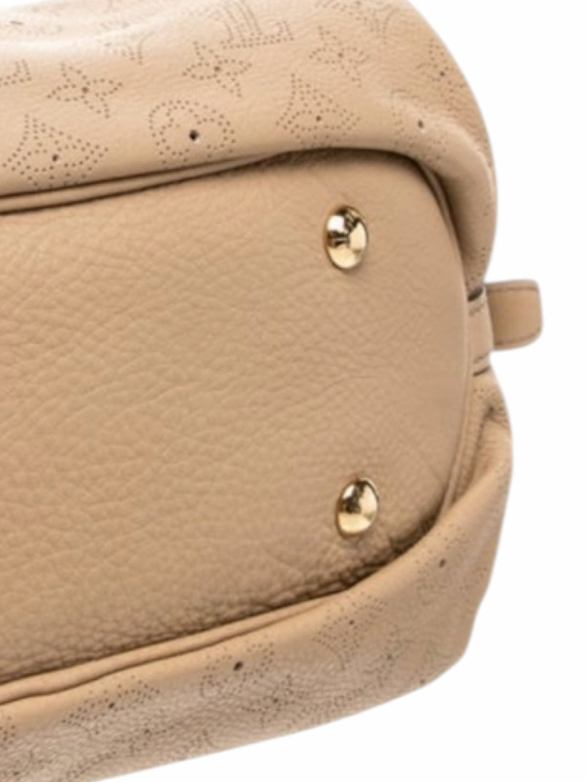 YoloLuxe Handbags beige perforated leather hobo bag base with gold-tone protective feet and monogram detailing.