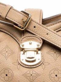 YoloLuxe Handbags beige perforated leather hobo bag with gold-tone push-lock hardware and adjustable shoulder strap