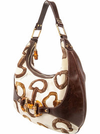 YoloLuxe Handbags Gucci bamboo print canvas hobo bag with brown leather trim and signature bamboo hardware details.